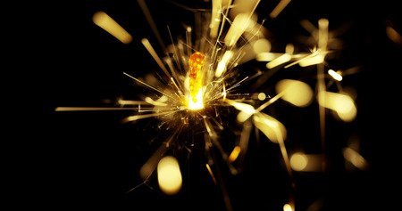 Macro shot of party sparks that shine and make the sparks. Used in parties with friends, in the...