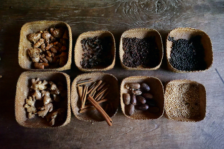 Top view of oriental spices divided into wooden bowls. Concept of: oriental culture and cuisine, food and spices.の写真素材
