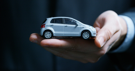 Shows a small car. Concept: car insurance, mechanical, leasing, purchase new and used cars and public garages.の写真素材