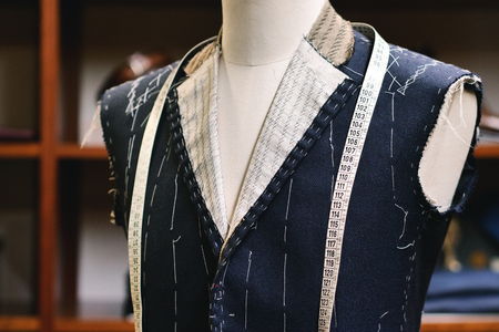 Close up of a suit hanging on a clothesline