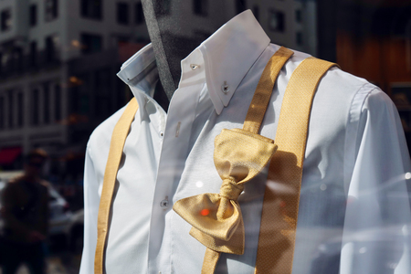 View of an elegant haute couture dress from a shop window.の写真素材