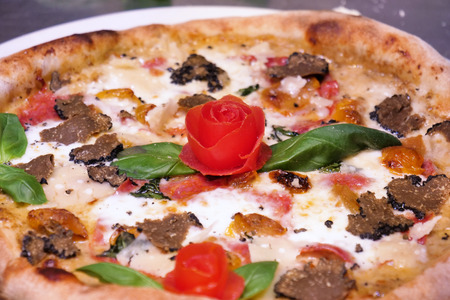 Italian gastronomy. Concept of: pizza, Italian tradition, Naples, Mediterranean flavorsの写真素材