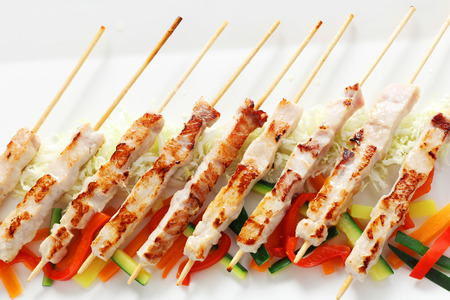 Close-up of a plate of oven-cooked skewers. Concept of: Italian cuisine, gourmet.の写真素材