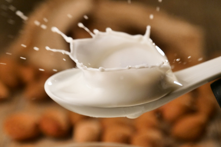Almond oil composition used for cosmetics, spa, wellness centers. Perfect body oil and moisturizing skin. Concept of: beauty, oils, creams, wellness.の写真素材
