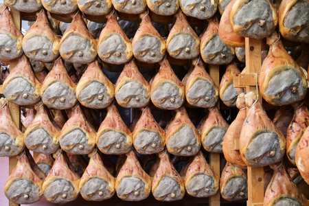 In a ham factory, there are hams to the end after having undergone the various processes according to the ancient Italian tradition. Concept of: tradition, italy, foodの写真素材