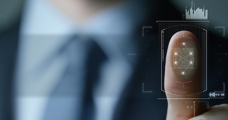 businessman scan fingerprint biometric identity and approval. concept of the future of security and password control through fingerprints in an immersive technology future and cybernetic, businessの写真素材