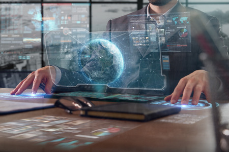 New technologies: a businessman uses a futuristic processor for augmented reality. high technology...