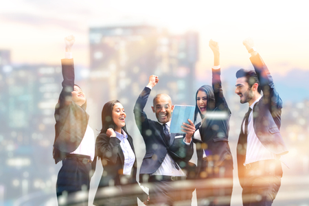 five people exult happiness for business and finance, concept of team, work and profit opportunities in marketing and financeの写真素材