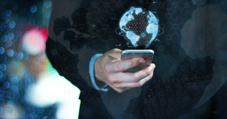 The young businessman navigating or sending an email with a smartphone.の写真素材