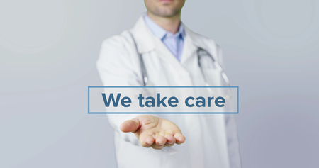Young male and clean doctor underscore with a phrase? on a hand in blue on transparent backgroundの写真素材