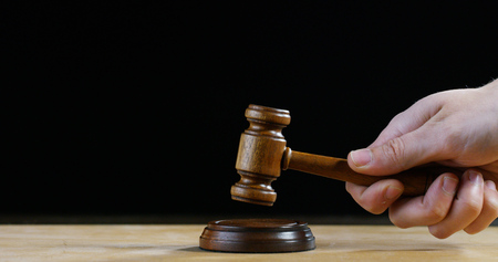 scene of lawyers or notaries with gavel judge for the insurance compensations. concept of law and...