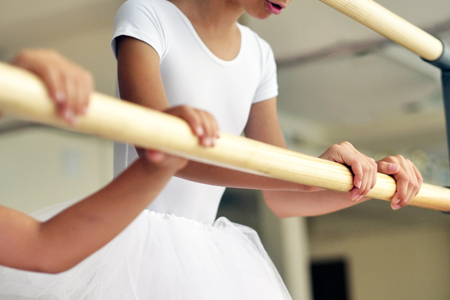 In a dance school, a beautiful girl, a train to learn new dance steps. Concept of: ambition,...