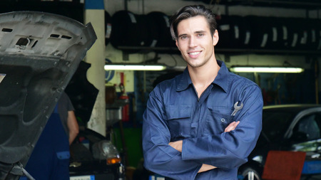 In a garage, a mechanic that has been checked and successfully cleaned. Concept of: security, safety, insurance and professionalismの写真素材