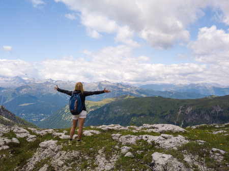 Portrait of a young woman looking at the air. Concept: freedom, happiness, travelの写真素材