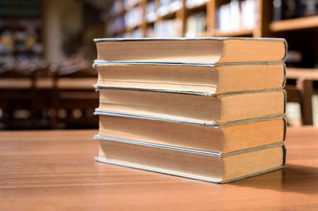 piles of books in library hall (Shallow depth of field)の写真素材