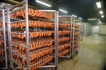 sausage processing in factory warehouse for storing meat products