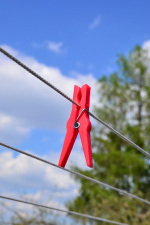 clothes-pegs on clotheslineの写真素材