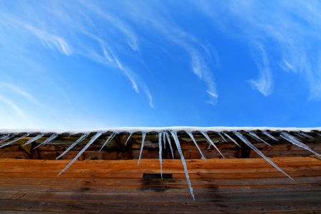Icicles on a roofの写真素材
