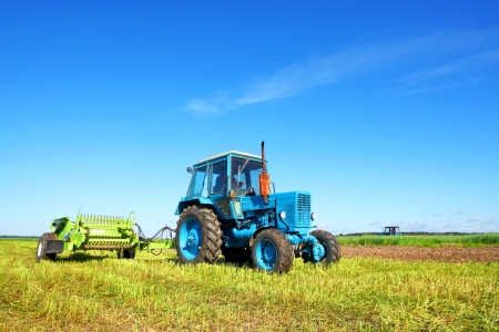 Tractor on a farmer fieldの写真素材