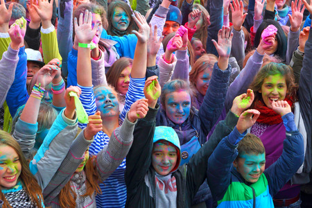 Gatchina,Leningrad region,Russia-29 September, 2013:The crowd of youth showers itself with paints in Gatchina, the Leningrad region, Russia 29 September,2013. Festival of paints.のeditorial素材
