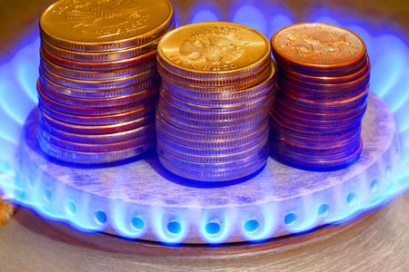 Payment for gas. Money and gas torch.Russian ruble.の写真素材