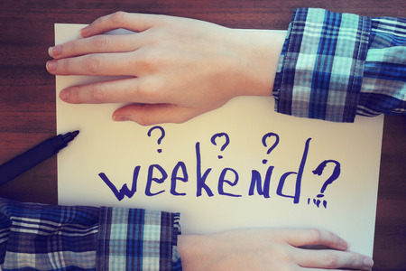 Plans for weekend.Photo toned in retro style.の写真素材