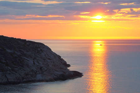 Bright warm sunset of the evening sea