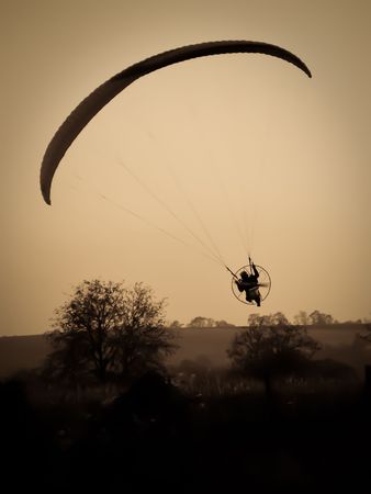View at paraglider flying over the horizonの写真素材