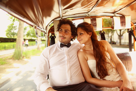 Bride and groom in a car in Paris, Franceの写真素材