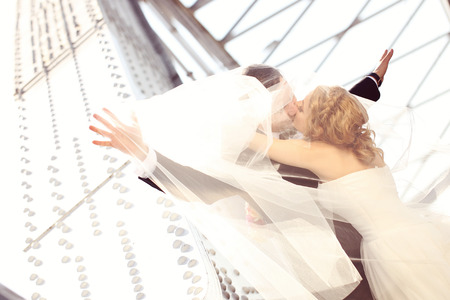 groom and bride kissingの写真素材