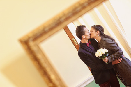 Couple kissing on their wedding dayの写真素材