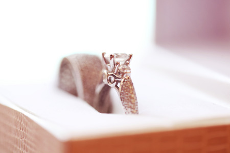 two wedding rings in a box