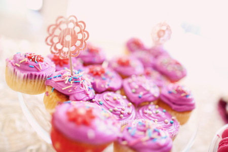 Delicious cupcakes on tableの写真素材