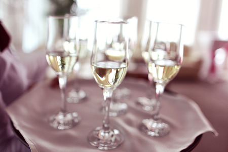 Four glasses of wine on a wedding day