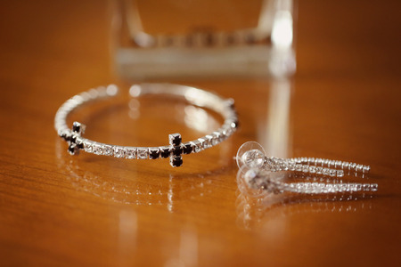 Earrings and bracelet with crystalsの写真素材