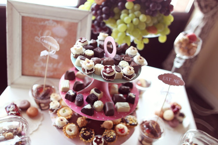 Delicious mix of sweets on table