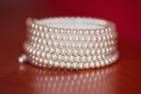 Pearl bracelet on tableの写真素材