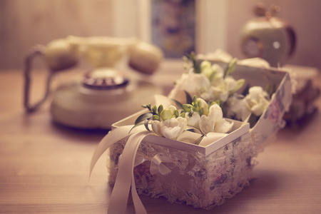 Flowers in elegant box on tableの写真素材