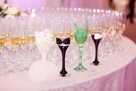 Glasses of champagne on tableの写真素材
