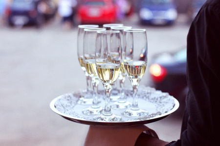 Waiter with champagne glassesの写真素材