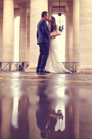 Bride and groom kissingの写真素材