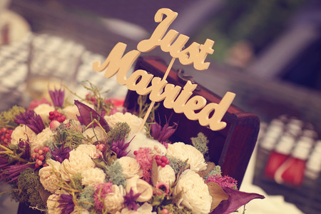 Just married sign in a flower bouquetの写真素材