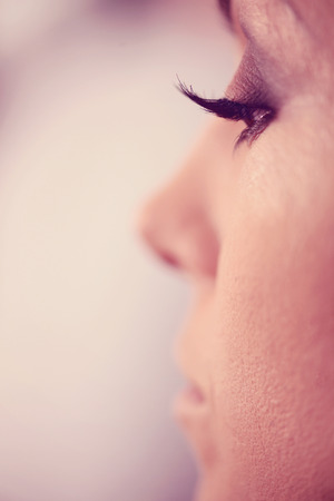Close up of woman wearing make up