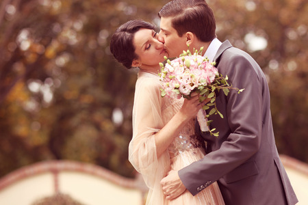 Bridal couple kissingの写真素材