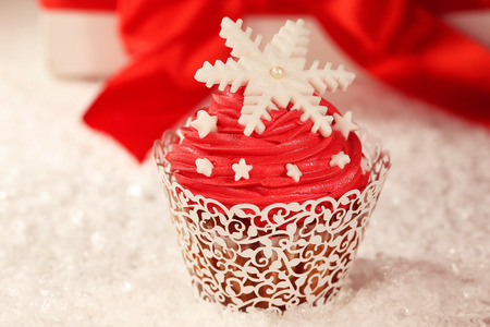 Red cupcake decorated with snowflakesの写真素材