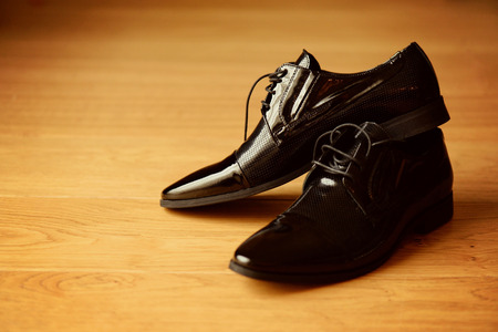 Groom black elegant shoesの写真素材