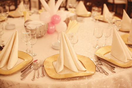 Decorated dining table for a birthday arty with balloons