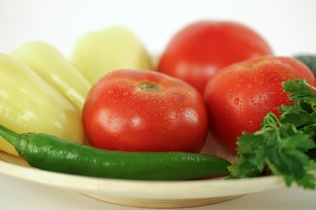 tomato and pepper on a white backgroundの写真素材
