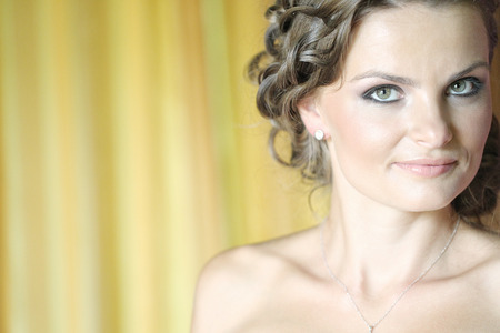 Beautiful woman bride makeup preparationの写真素材