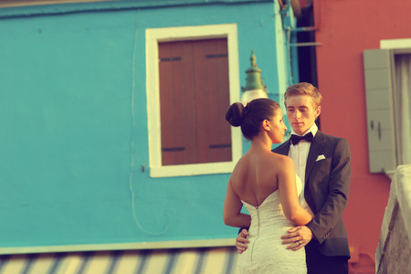 Bride and groom embracing in Venice, Italyの写真素材